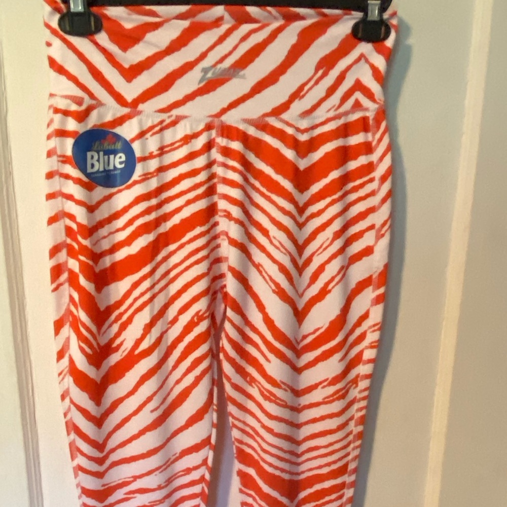 Orange striped labat blue leggings